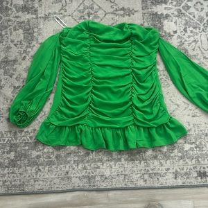 Green off the shoulder dress.